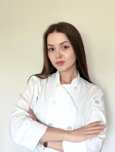 Chef Valentyna wearing a white chef coat